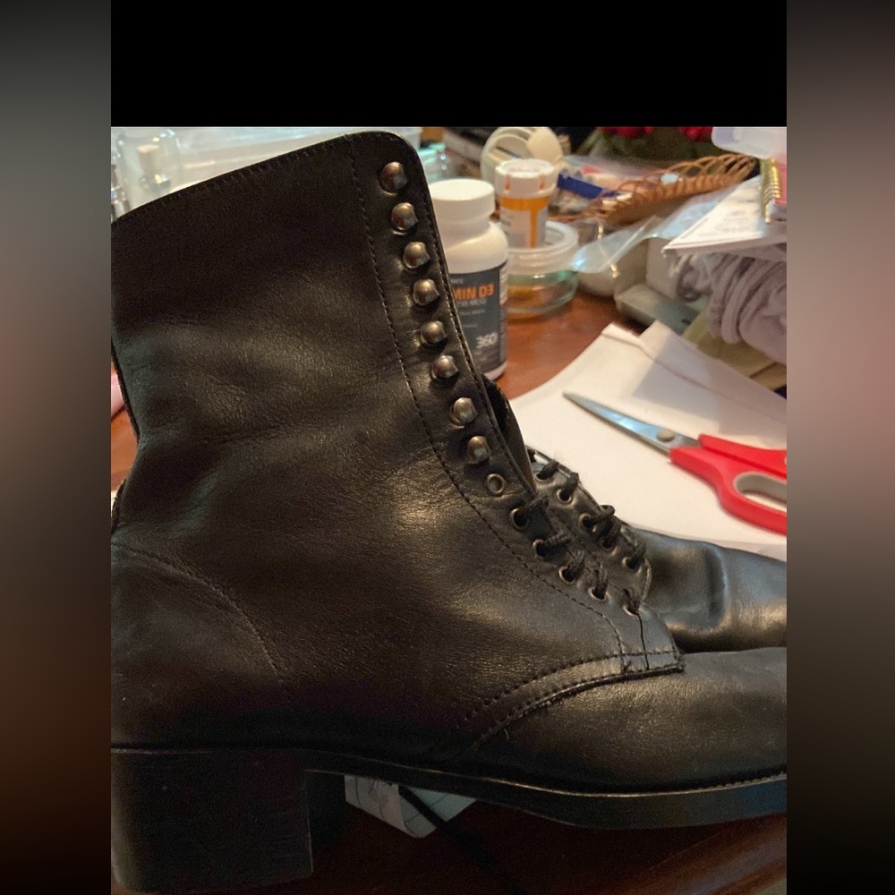 Black combat boots in excellent used condition